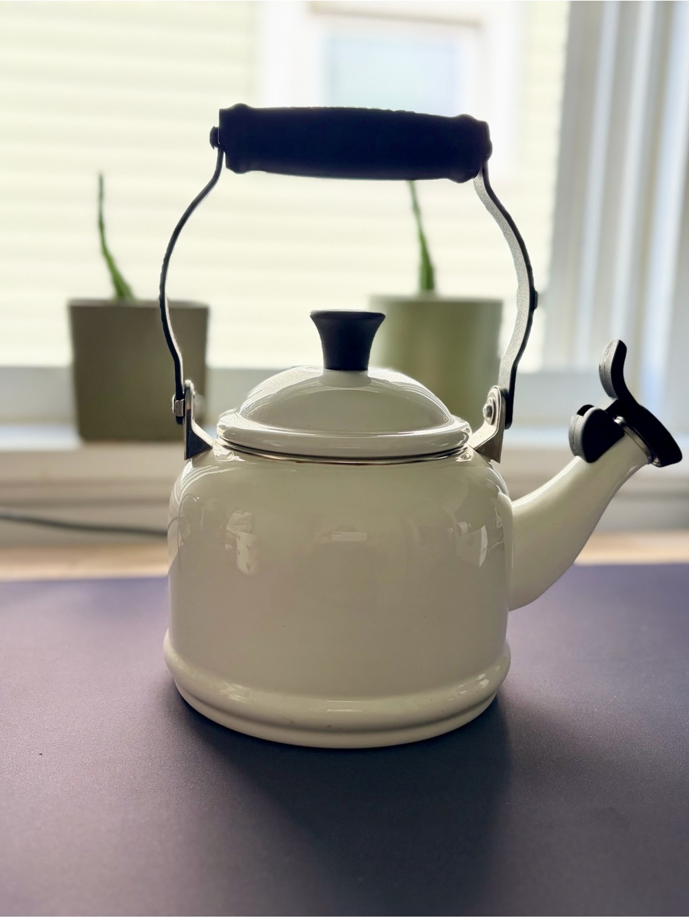 Le Creuset White Enamel Tea Kettle with Black Handle and Whistle